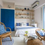 墾丁海島度假風格民宿客房，搭配藍、白色百葉窗