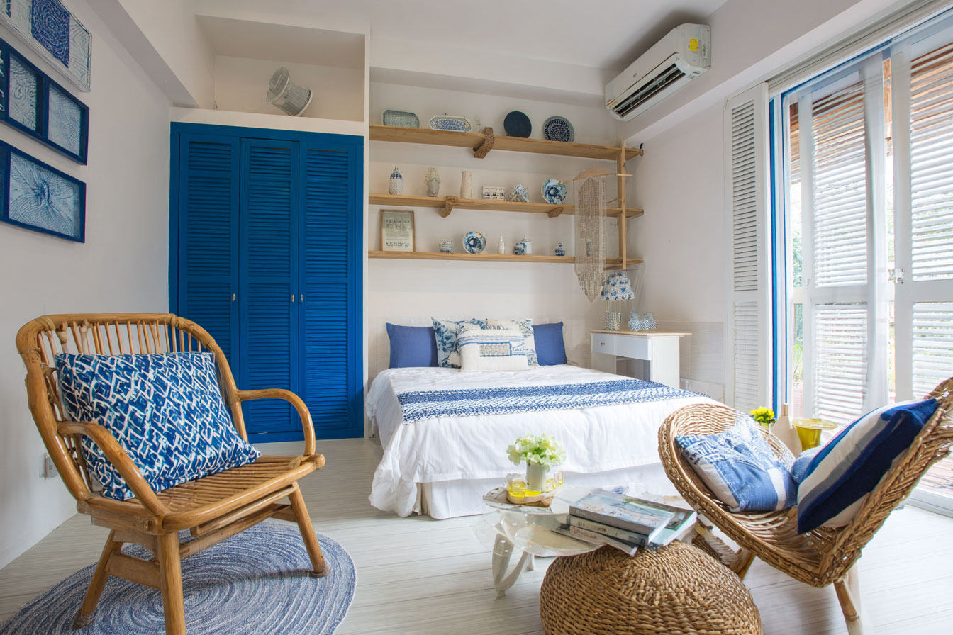 墾丁海島度假風格民宿客房，搭配藍、白色百葉窗
